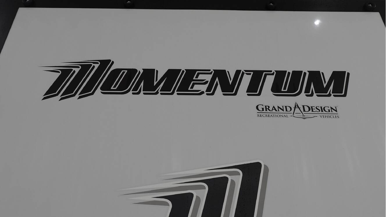 A photo of this 2026 Grand Design MOMENTUM 344M