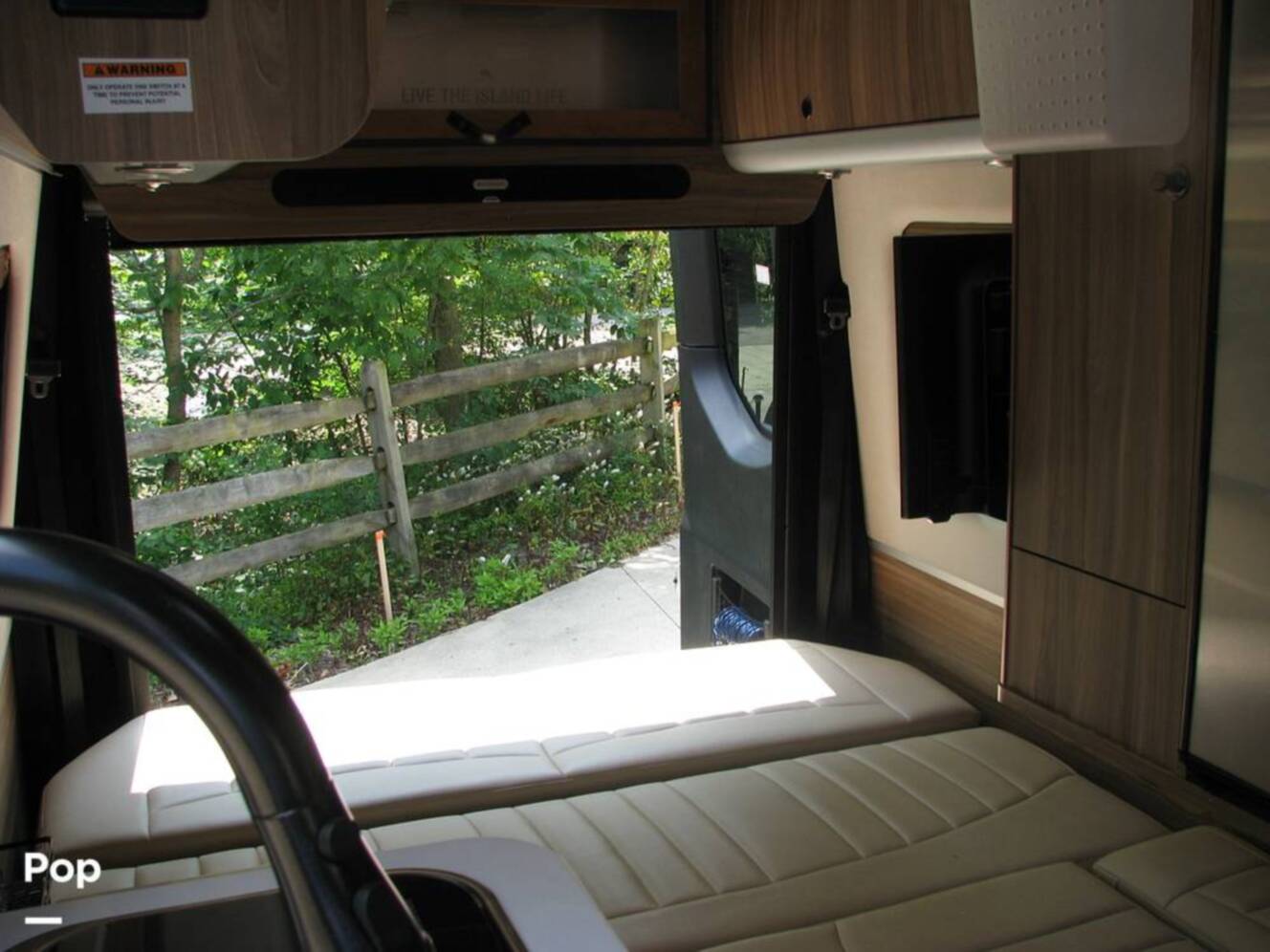 A photo of this 2022 Airstream Interstate 19 Tommy Bahama 4x4