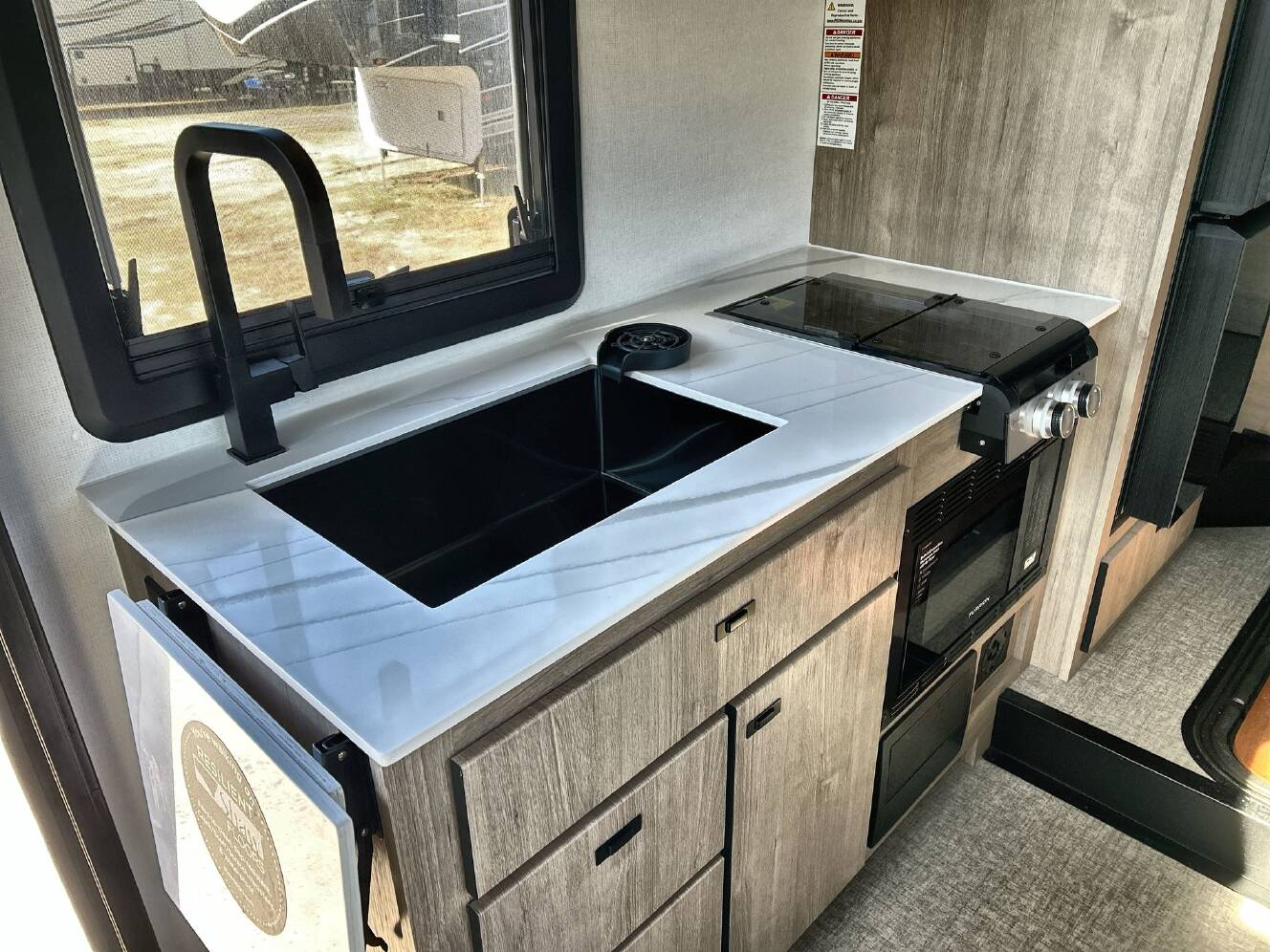 A photo of this 2026 Grand Design Lineage Series M 25TK