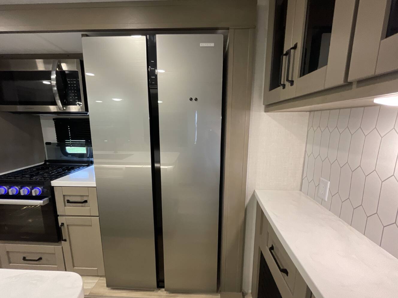 A photo of this 2025 Grand Design REFLECTION 315RLTS