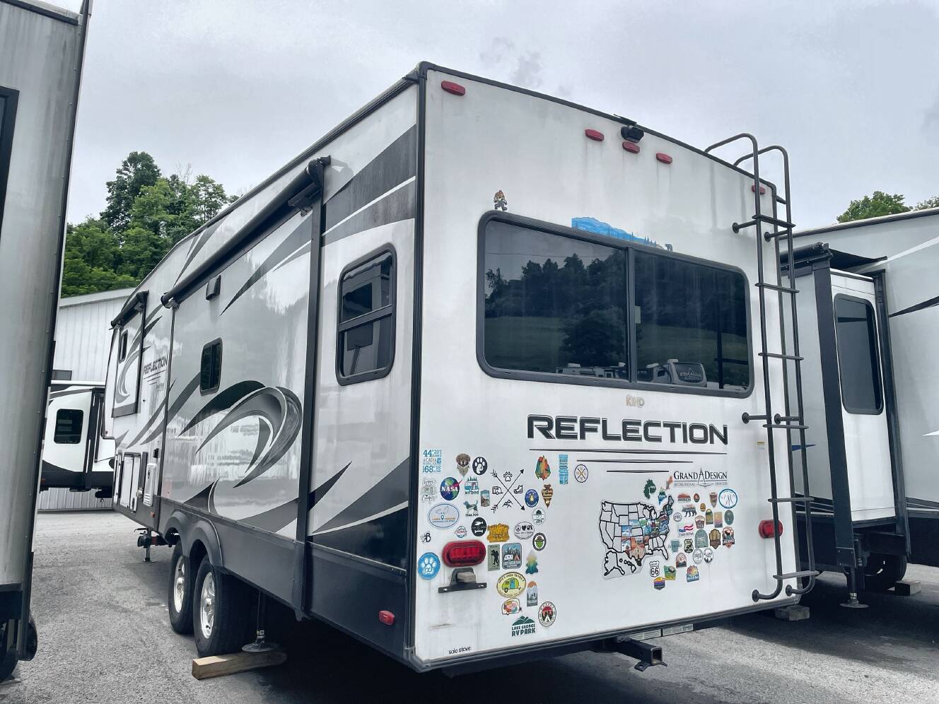 A photo of this 2024 Grand Design REFLECTION 303RLS