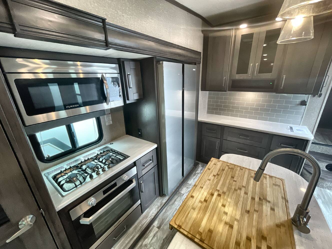 A photo of this 2024 Grand Design REFLECTION 303RLS