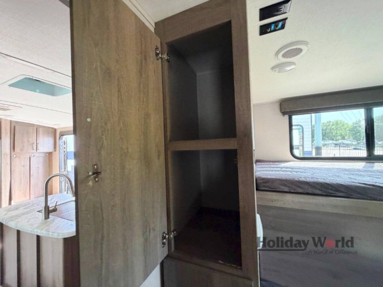 A photo of this 2021 Grand Design Imagine 3250BH