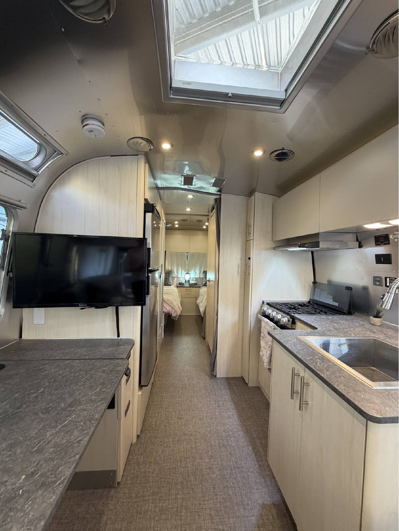 A photo of this 2023 Airstream FLYING CLOUD 25FB TWIN
