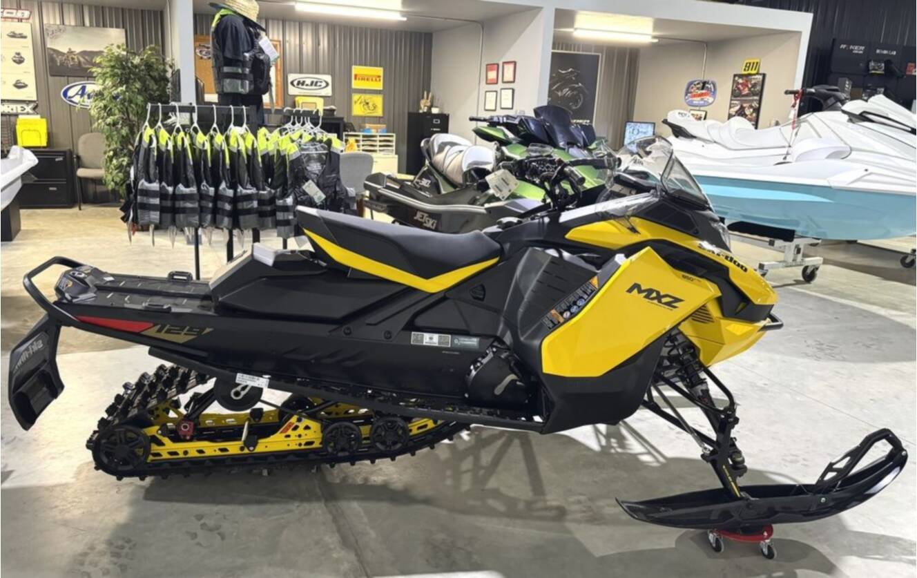 A photo of this 2025 Ski-Doo MXZ® Adrenaline® 850 E-TEC129 RipSaw 1.25_Yellow