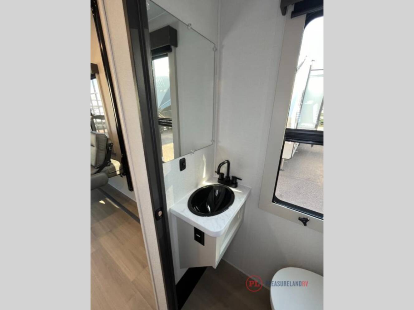 A photo of this 2027 Grand Design Momentum 395MT