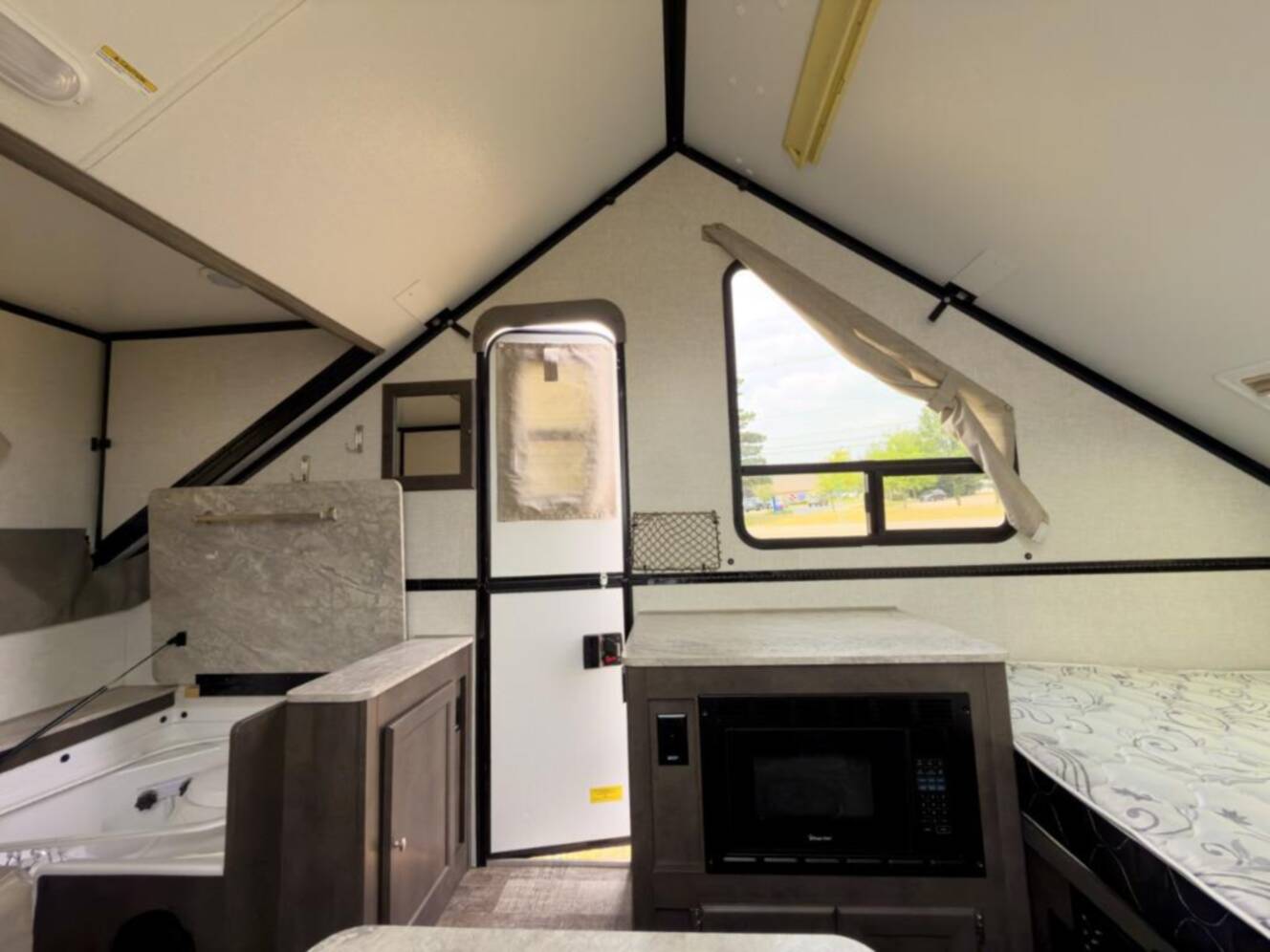 A photo of this 2021 Forest River Rv Rockwood Hard Side High Wall Series A214HW