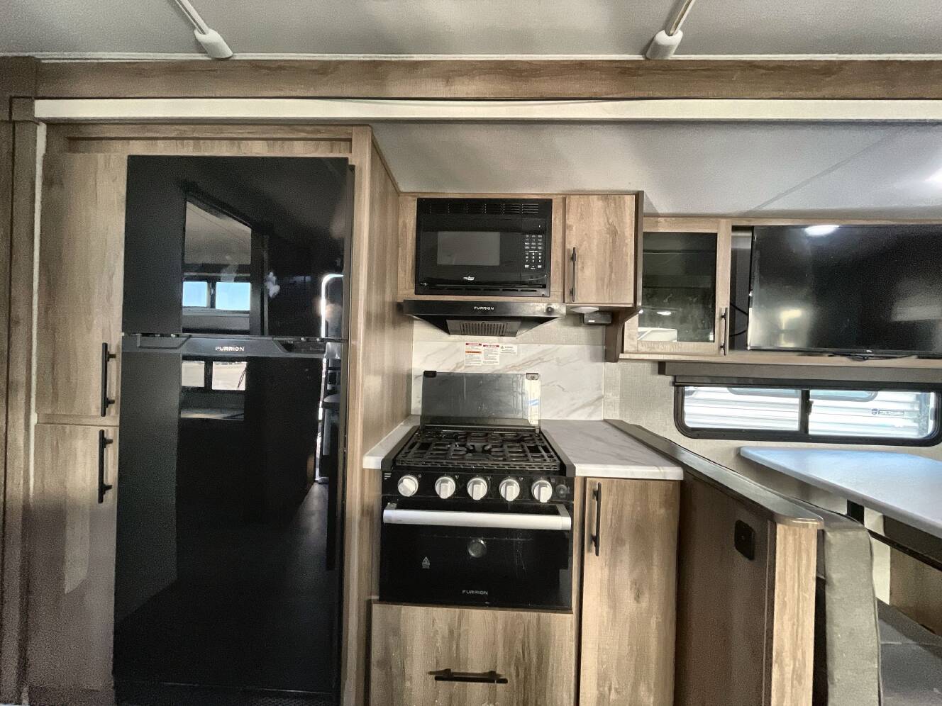 A photo of this 2024 Grand Design IMAGINE 3210BH