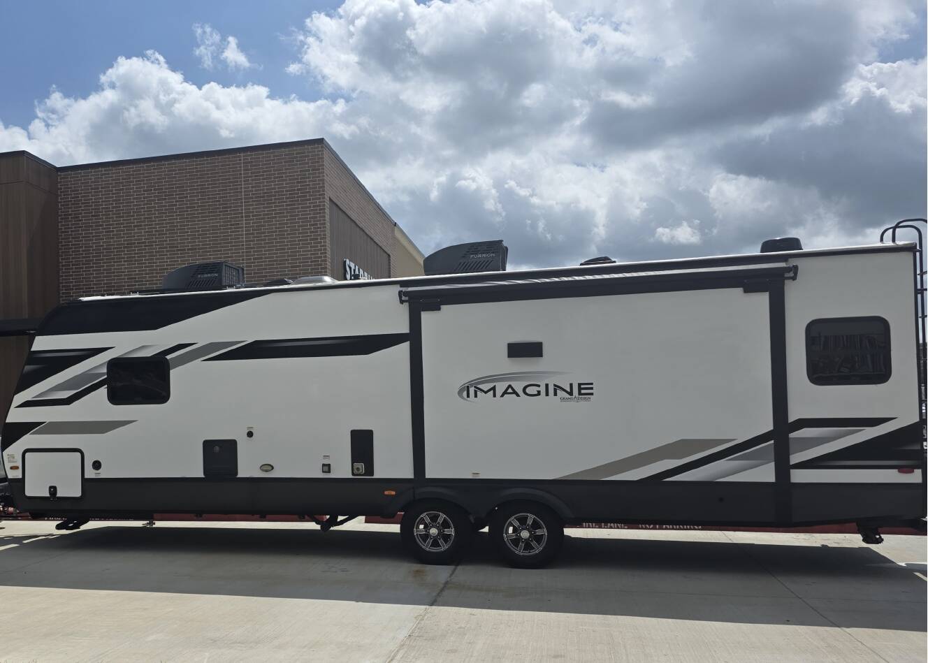 A photo of this 2023 Grand Design IMAGINE 2970RL