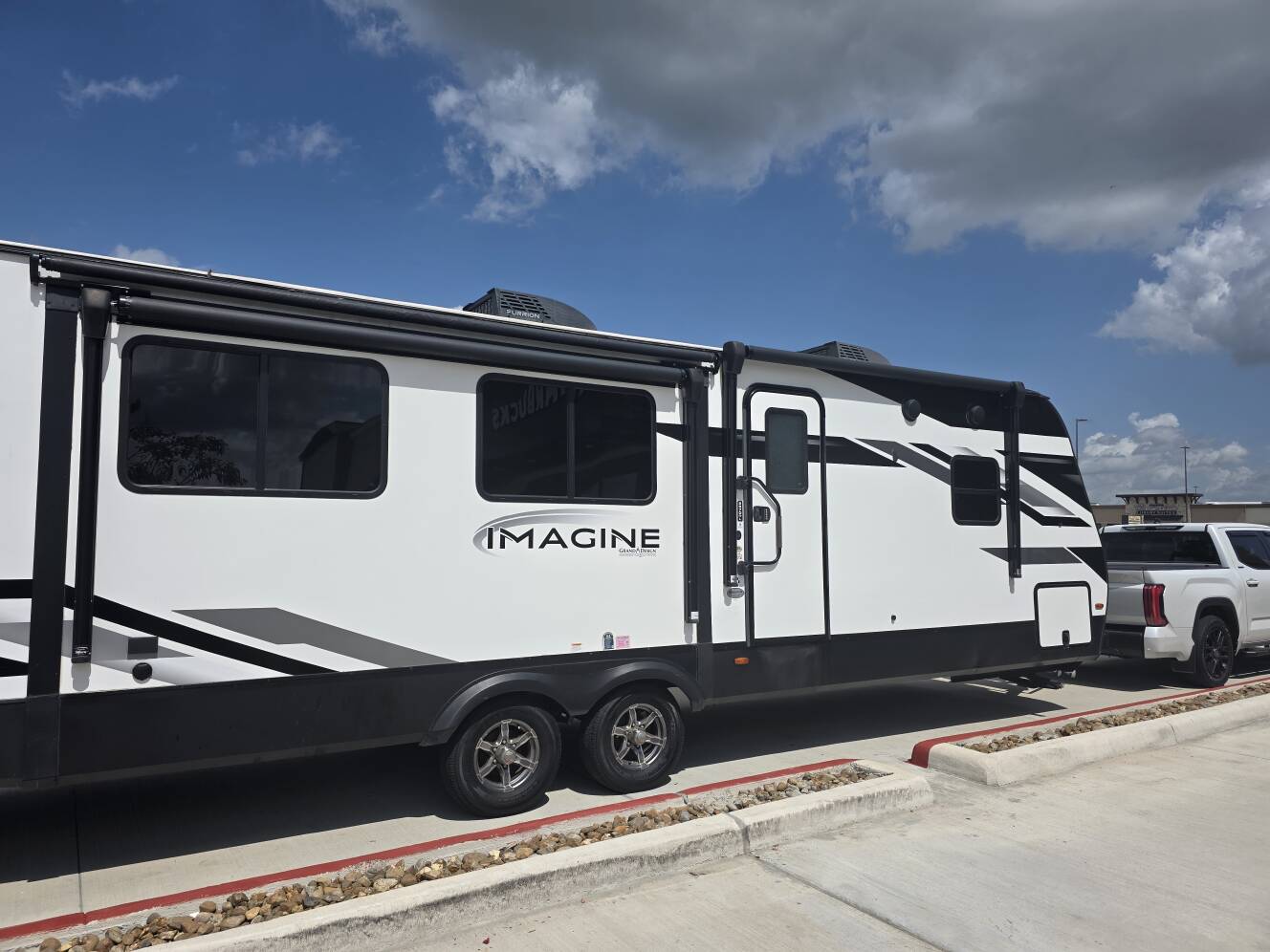 A photo of this 2023 Grand Design IMAGINE 2970RL