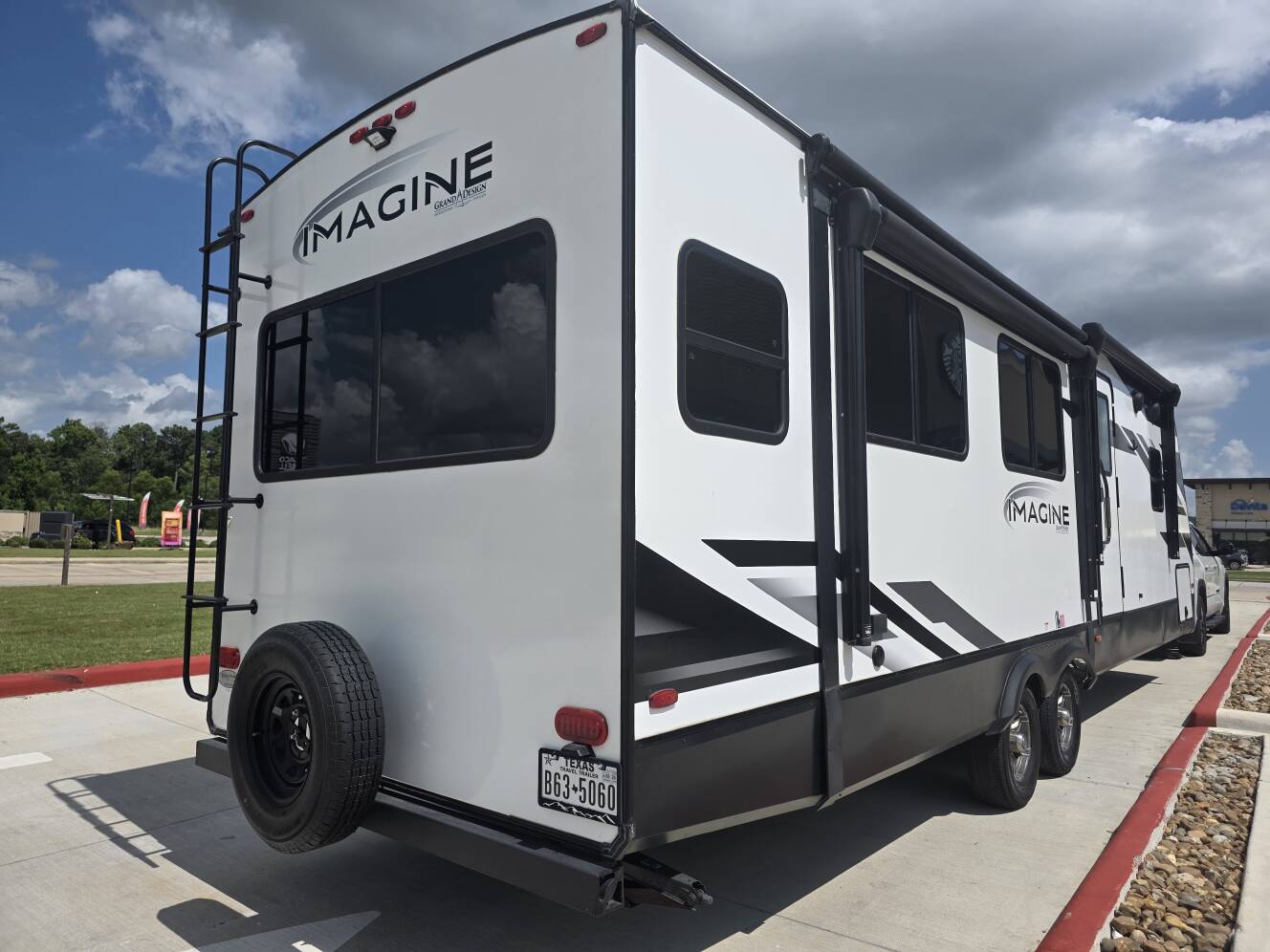 A photo of this 2023 Grand Design IMAGINE 2970RL