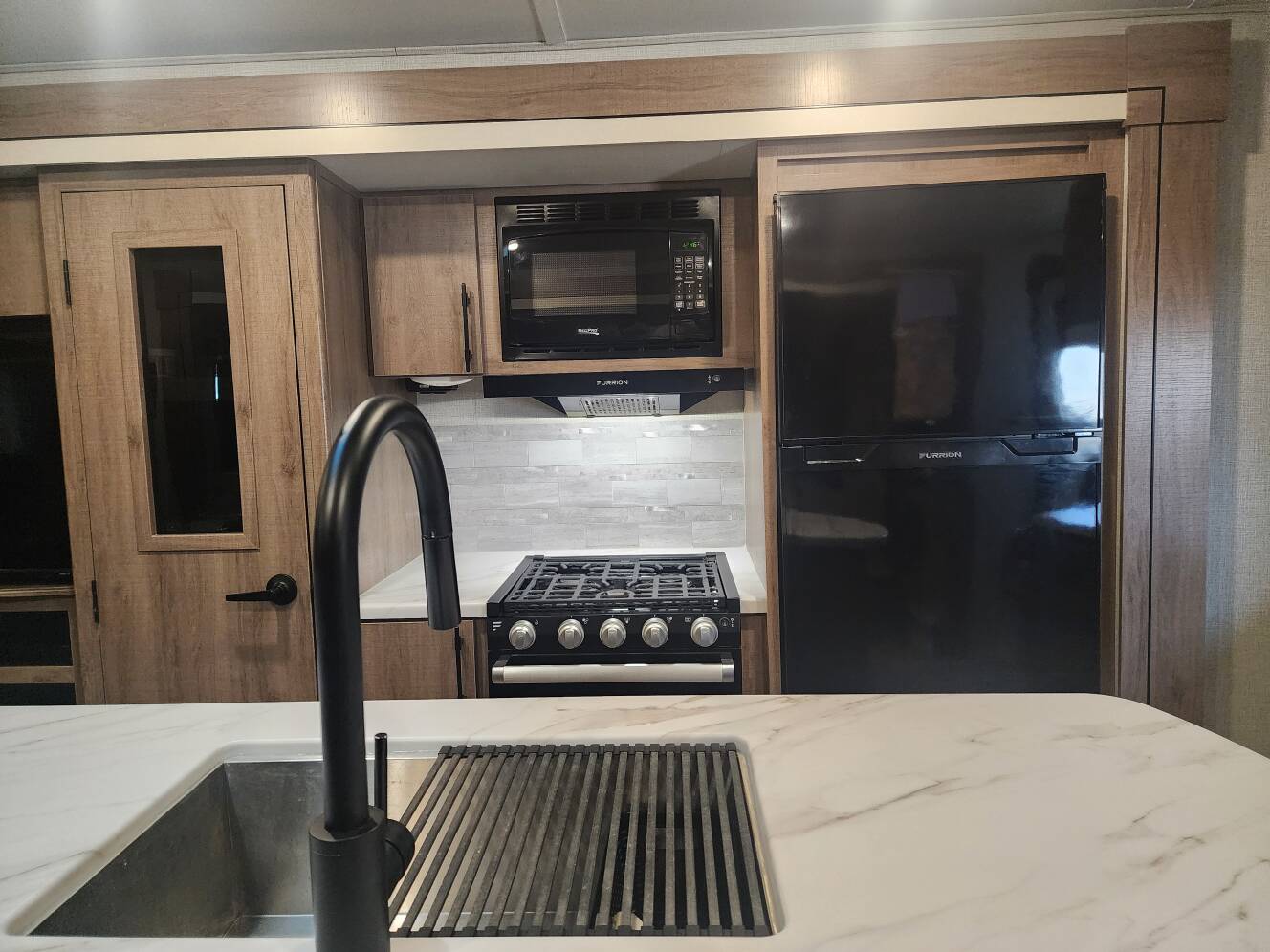 A photo of this 2023 Grand Design IMAGINE 2970RL