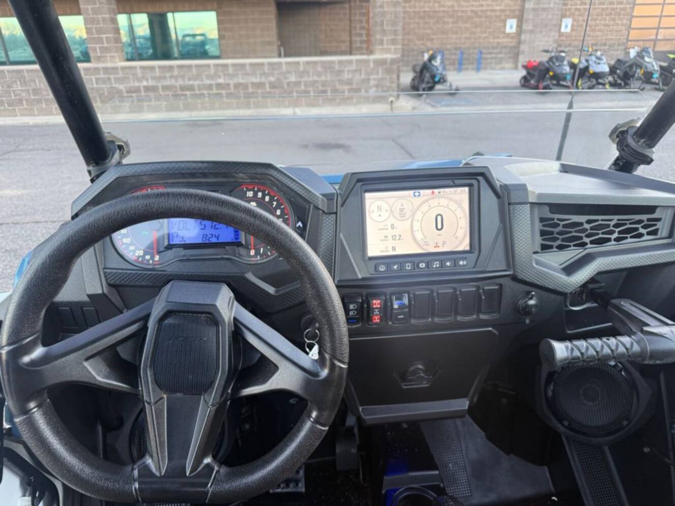A photo of this 2024 Polaris RZR Trail Ultimate - Storm Blue / White Lightning.