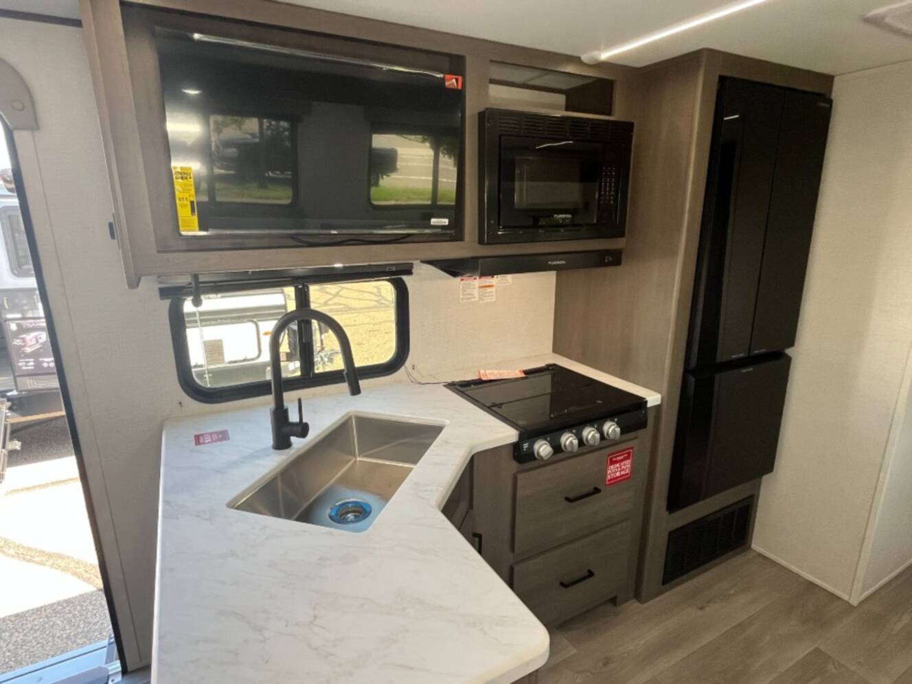 A photo of this 2026 Grand Design Transcend 335BHT