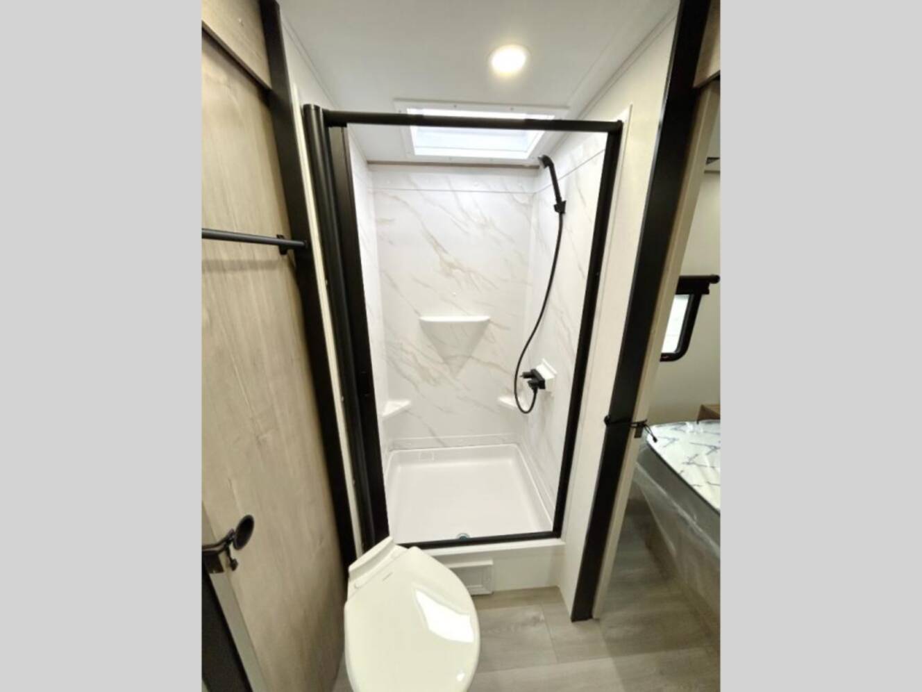 A photo of this 2026 Grand Design Imagine 3210BH