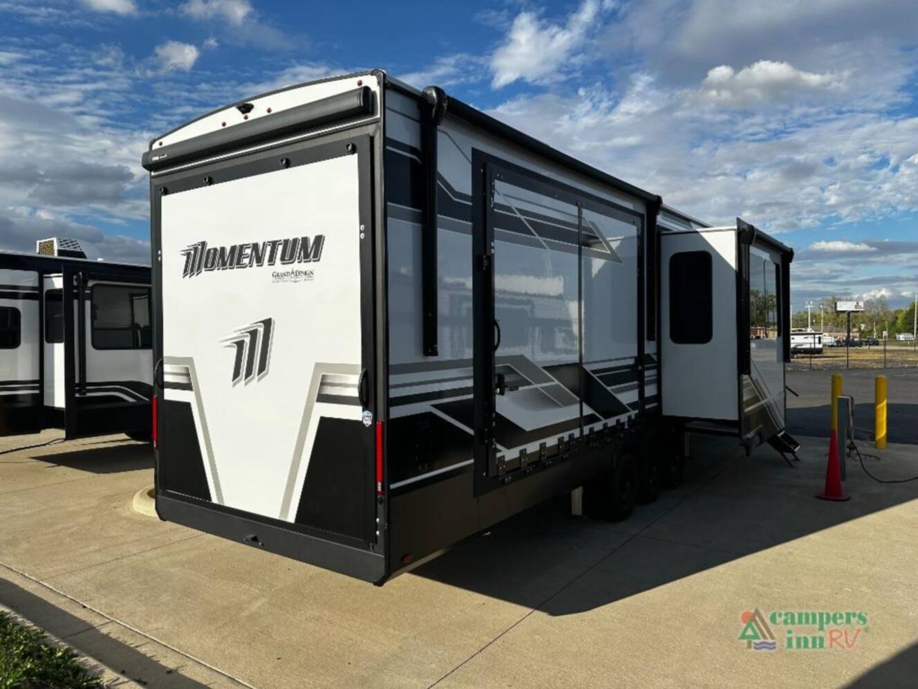 A photo of this 2026 Grand Design Momentum M-Class 399M