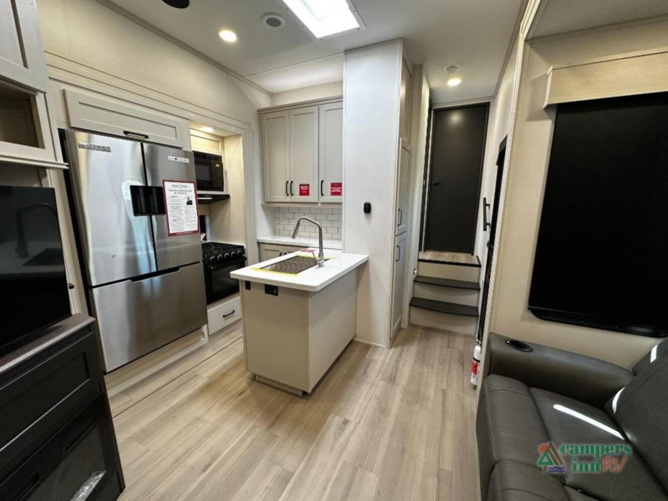 A photo of this 2026 Grand Design Momentum G-Class 320G