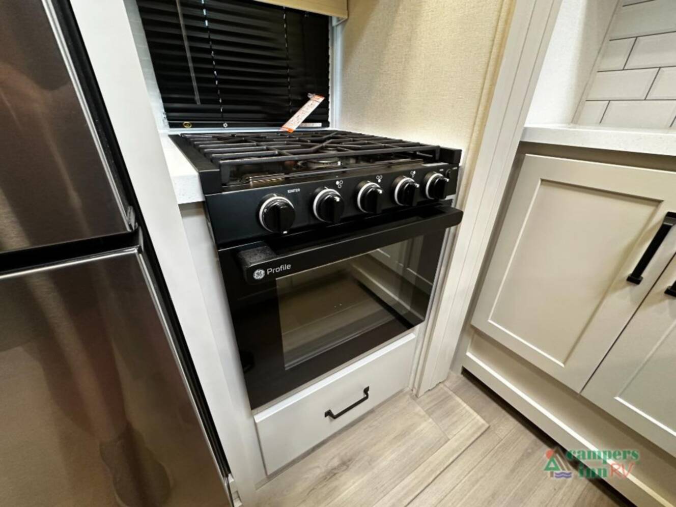 A photo of this 2026 Grand Design Momentum G-Class 320G