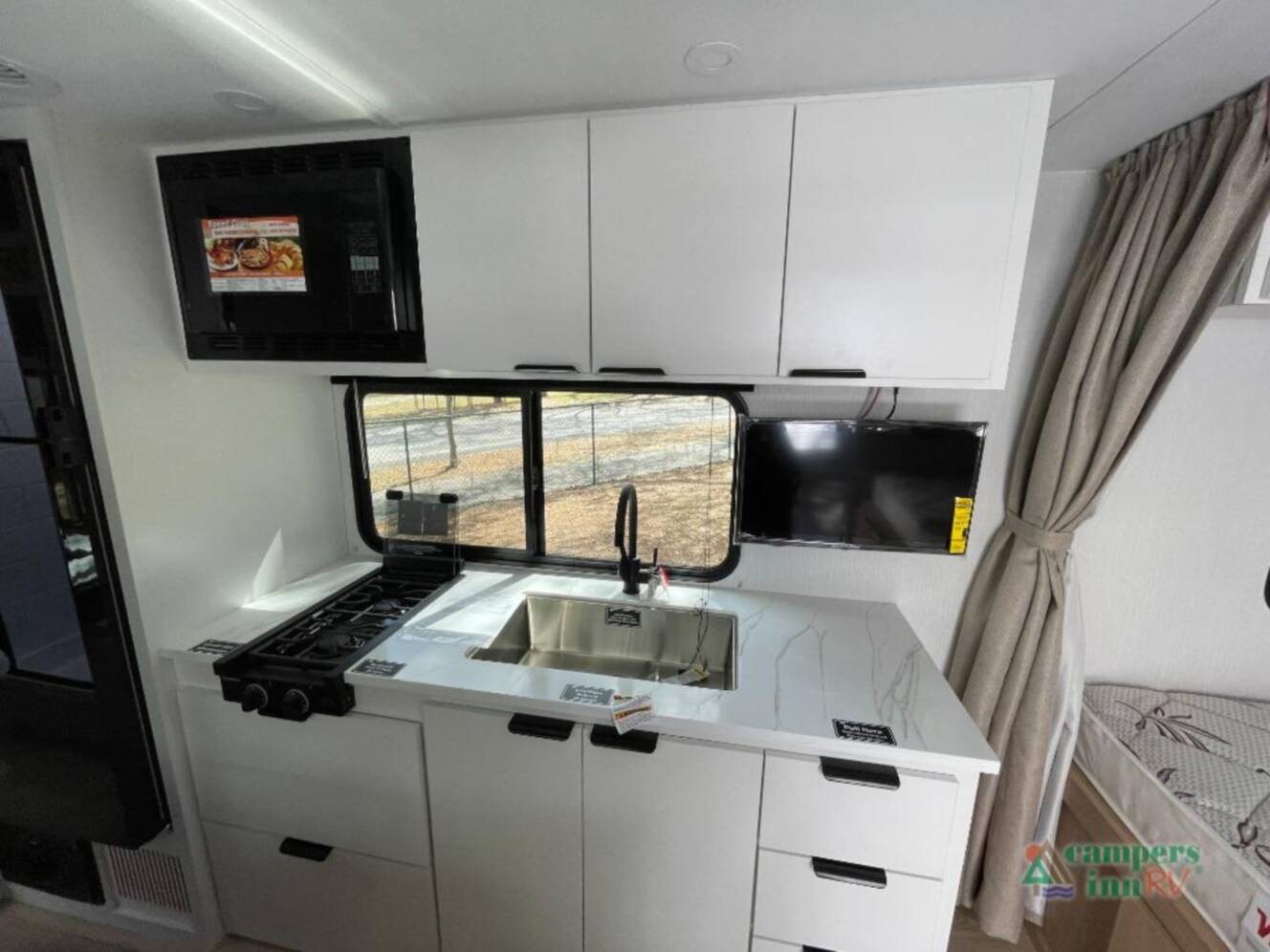 A photo of this 2026 Winnebago Micro Minnie 2000TRB