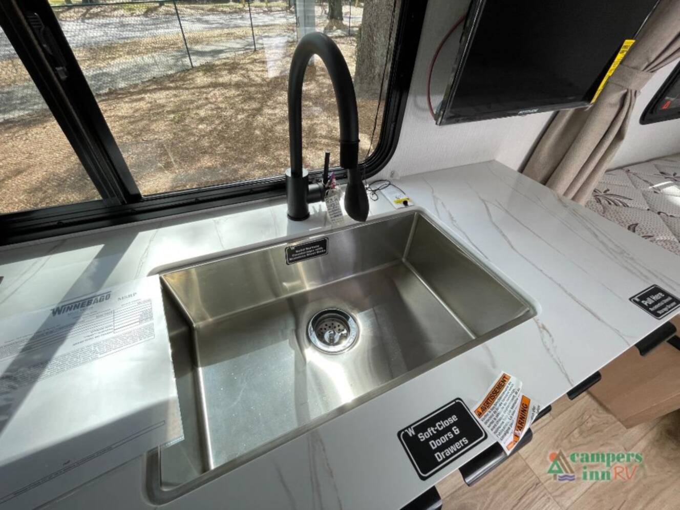 A photo of this 2026 Winnebago Micro Minnie 2000TRB