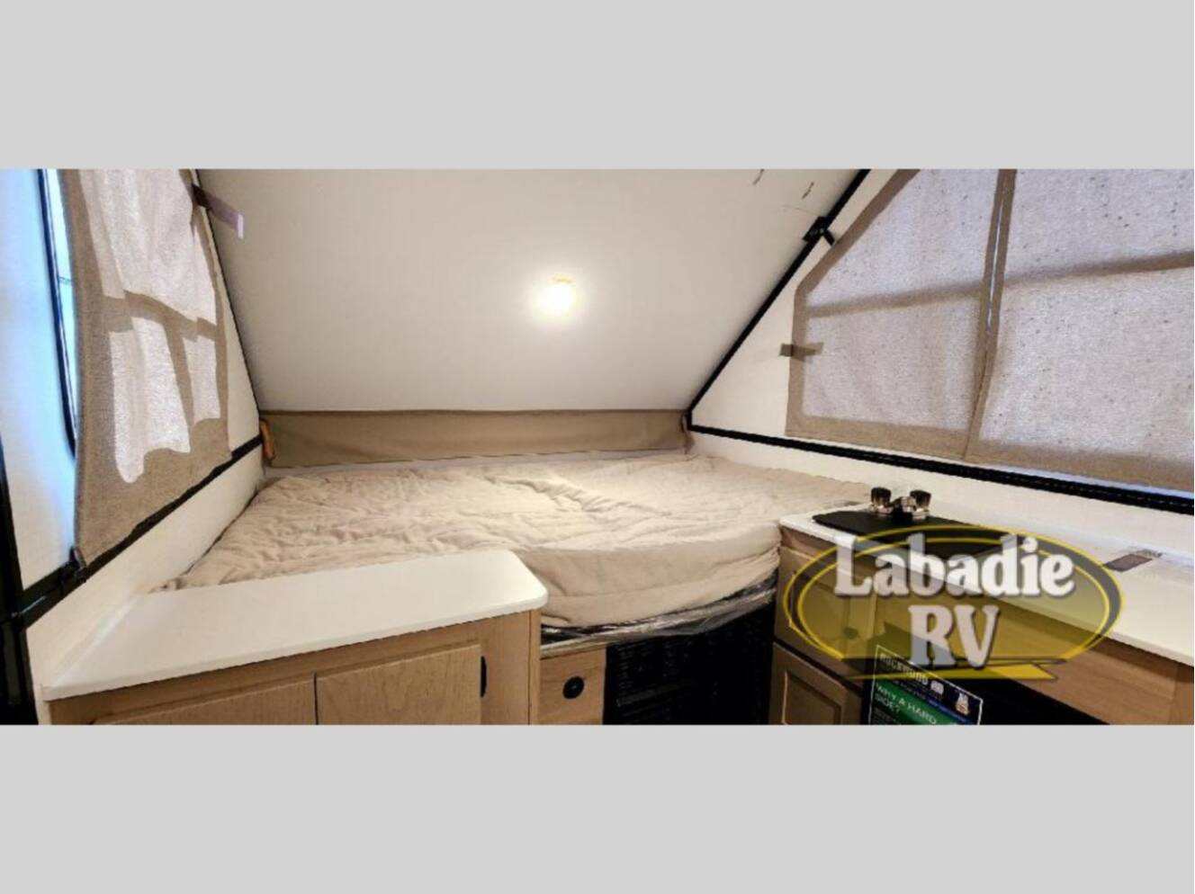 A photo of this 2025 Forest River Rv Rockwood Hard Side High Wall Series A101RB