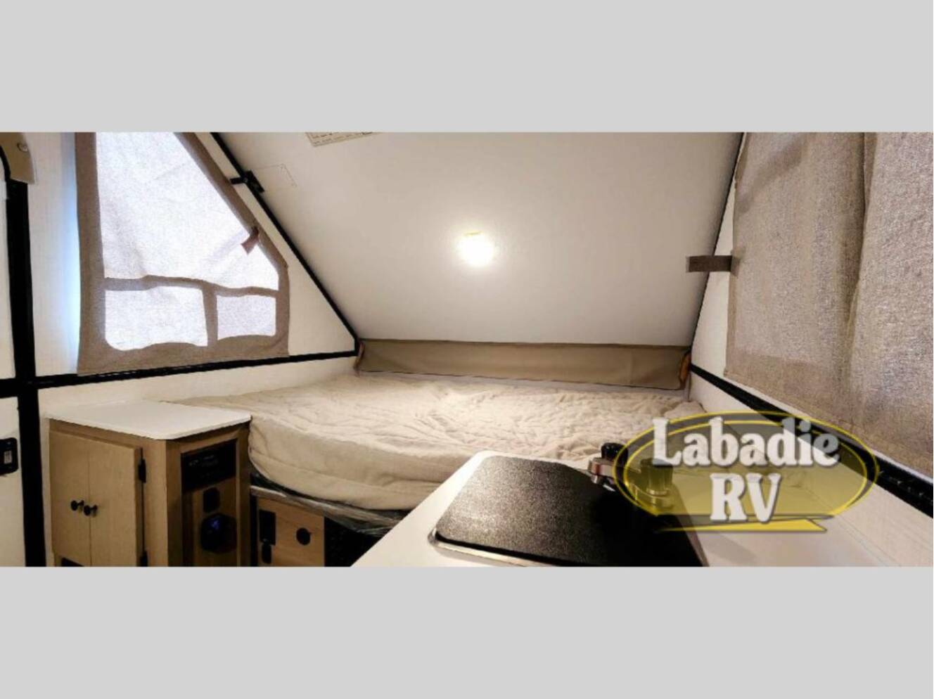 A photo of this 2025 Forest River Rv Rockwood Hard Side High Wall Series A101RB
