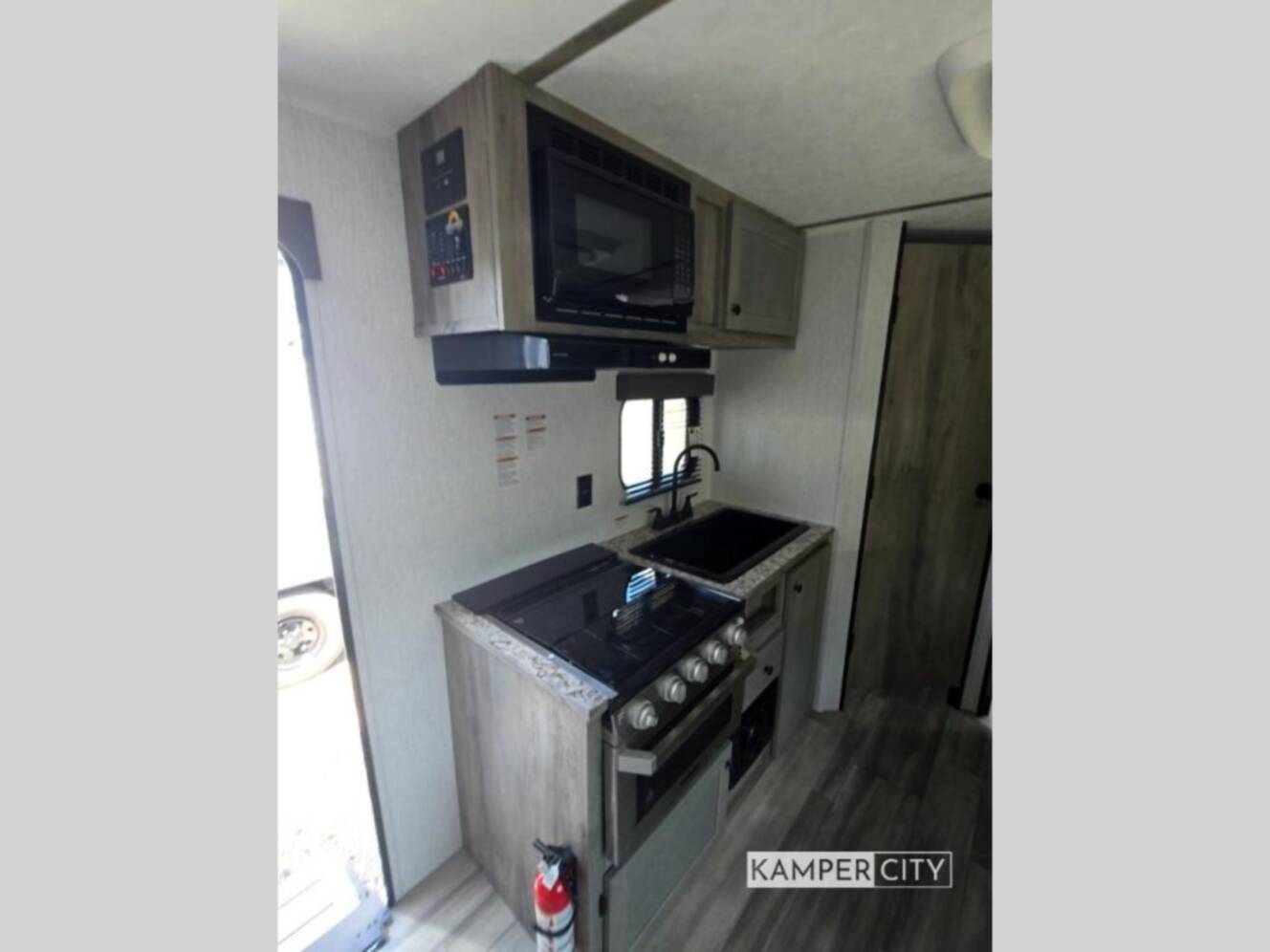 A photo of this 2026 Sunset Park Rv Sun Lite LTD 21DO