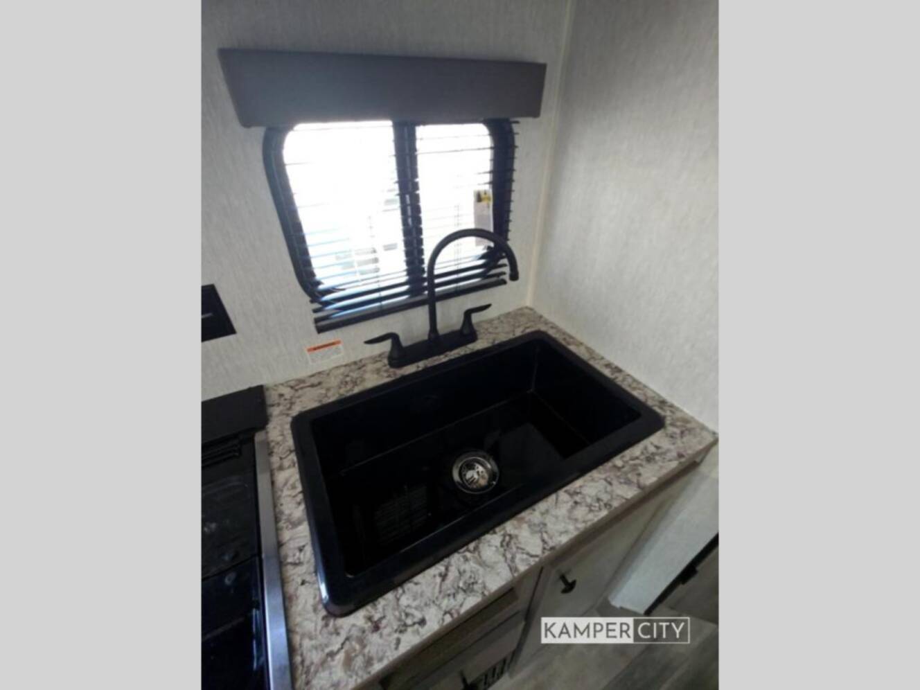 A photo of this 2026 Sunset Park Rv Sun Lite LTD 21DO