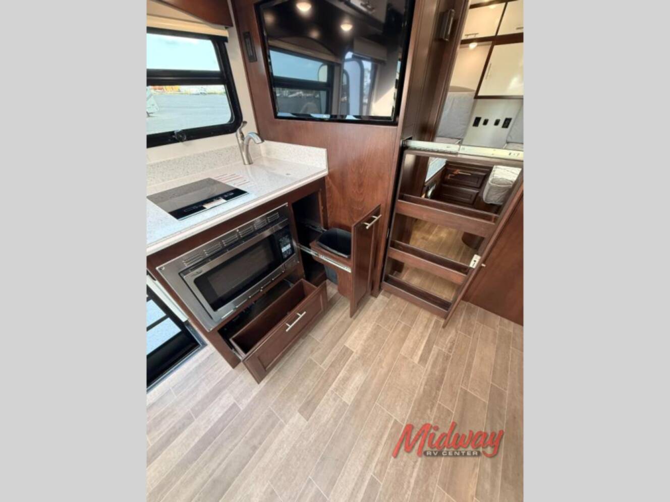 A photo of this 2021 Regency Rv Ultra Brougham UB25TBS
