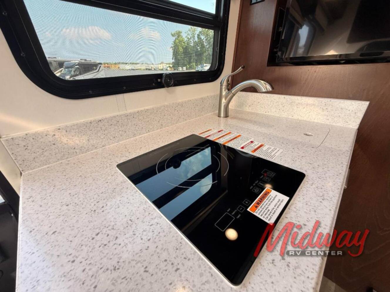 A photo of this 2021 Regency Rv Ultra Brougham UB25TBS