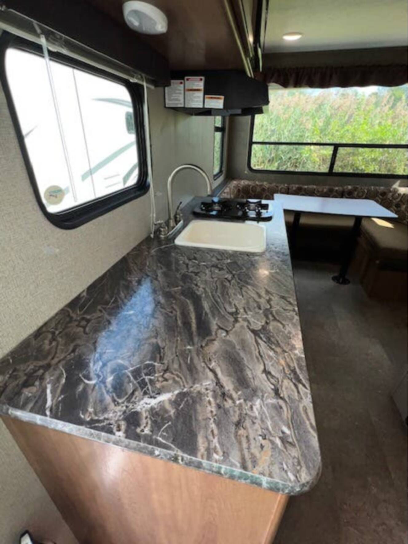 A photo of this 2018 Keystone Springdale Summerland Mini 1750RD Front East-West Queen