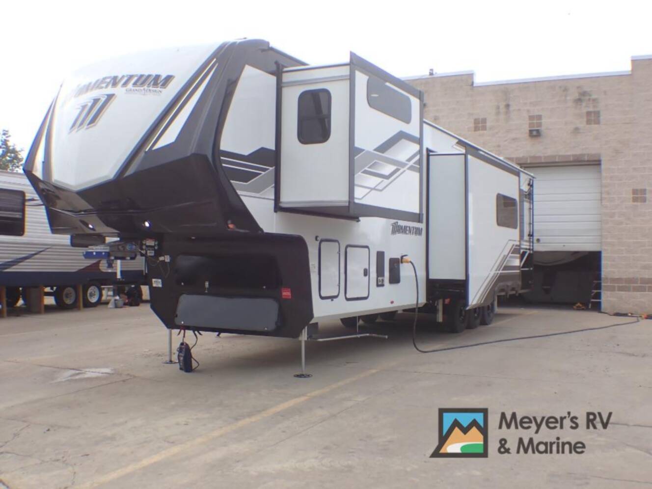 A photo of this 2026 Grand Design Momentum 399M