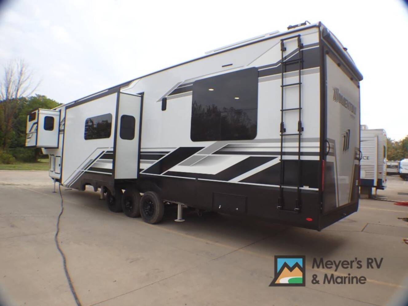 A photo of this 2026 Grand Design Momentum 399M