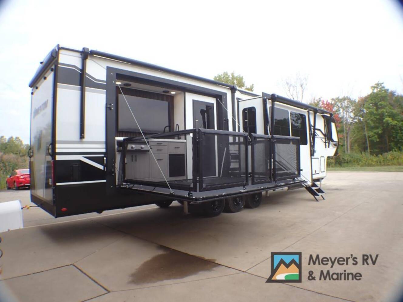 A photo of this 2026 Grand Design Momentum 399M