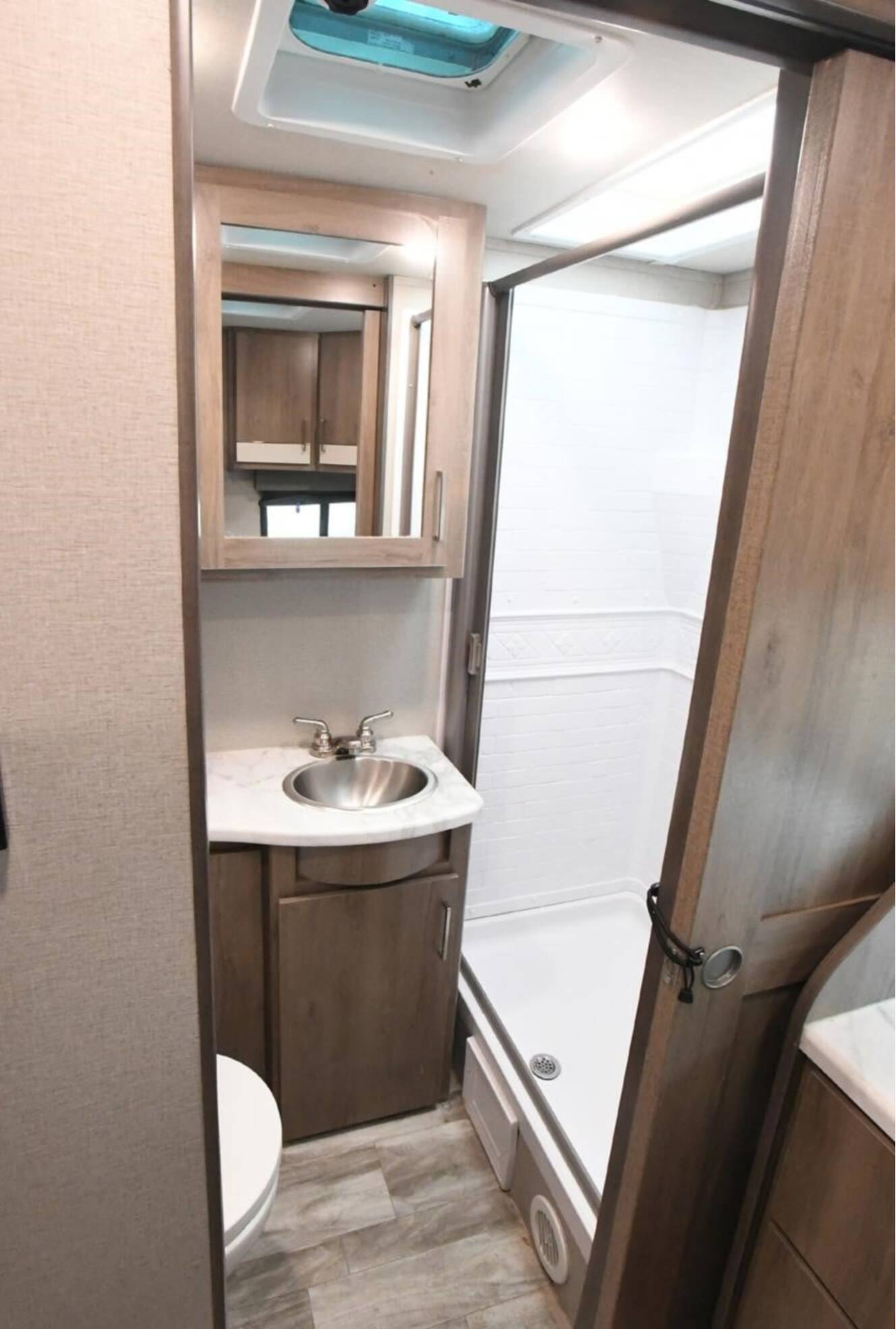 A photo of this 2022 Grand Design IMAGINE XLS 22MLE