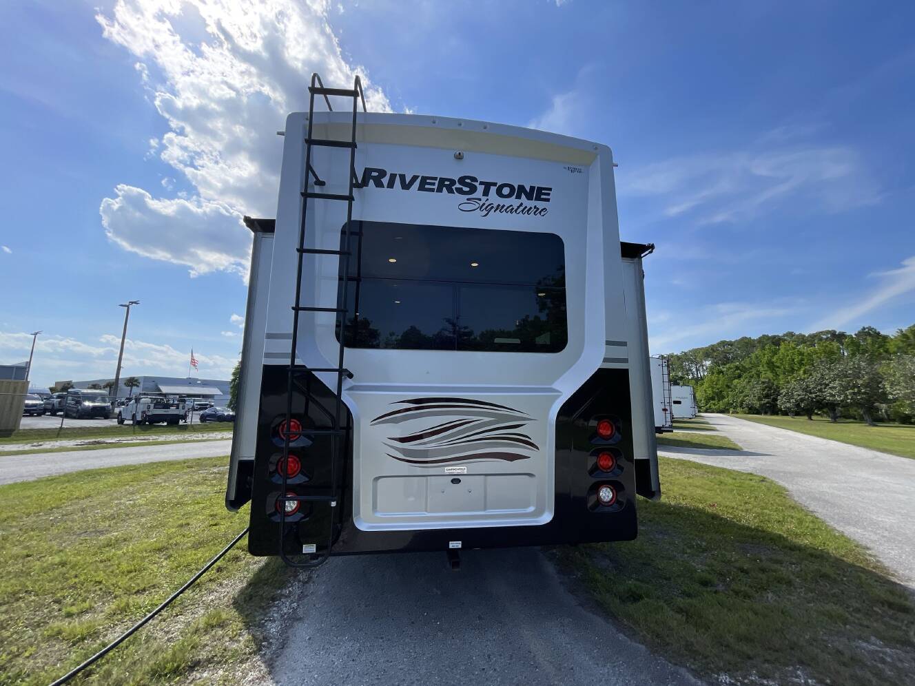 A photo of this 2023 Forest River RIVERSTONE 41RL