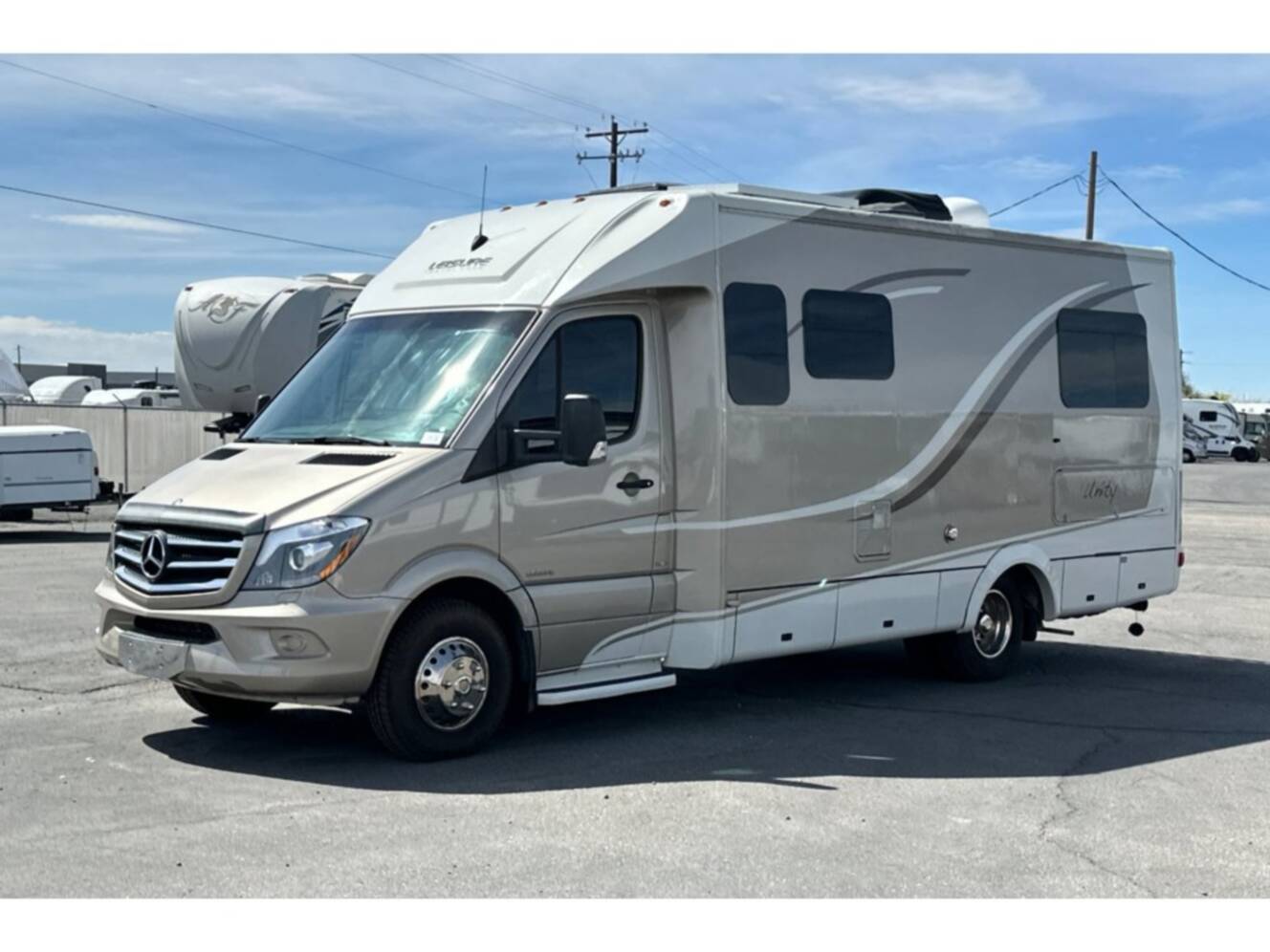 A photo of this 2014 Leisure Travel UNITY 24TB