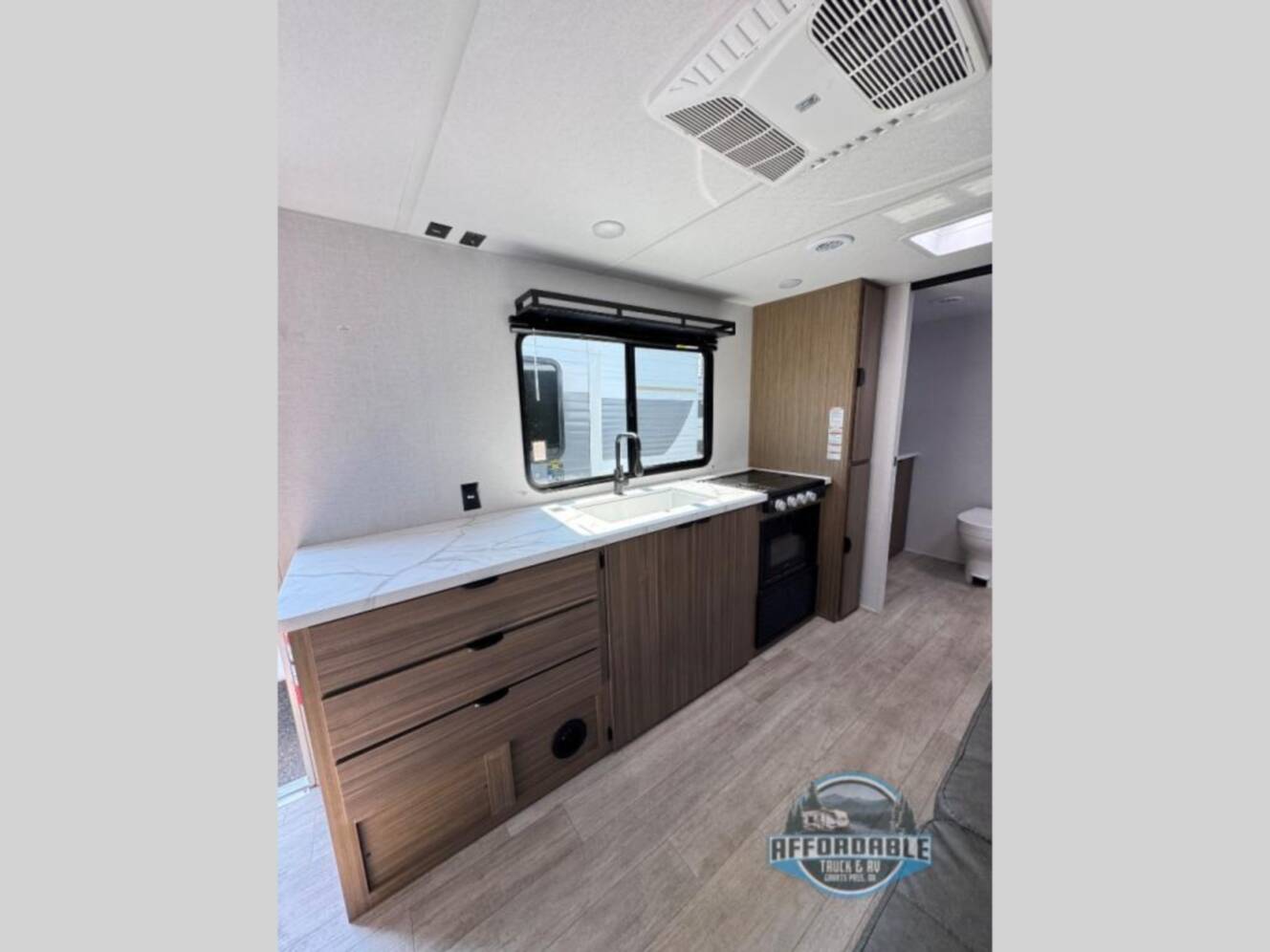 A photo of this 2026 Forest River Rv Wildwood FSX 233RBLE