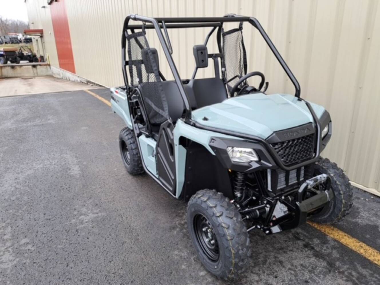A photo of this 2026 Honda® Pioneer 520