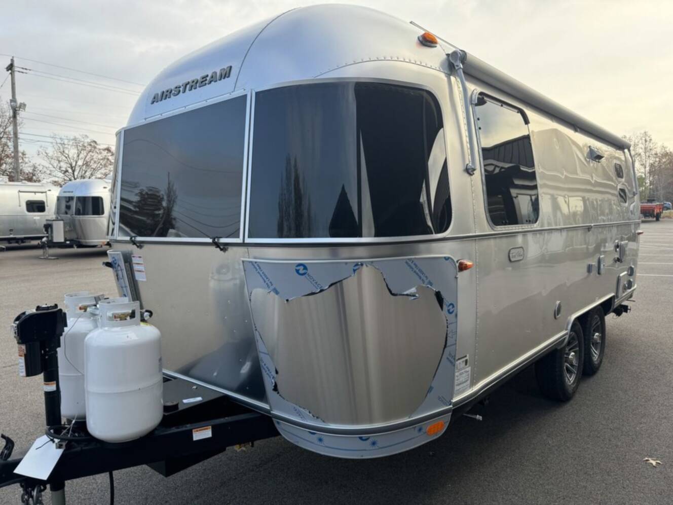 A photo of this 2025 Airstream Trade Wind 23FB