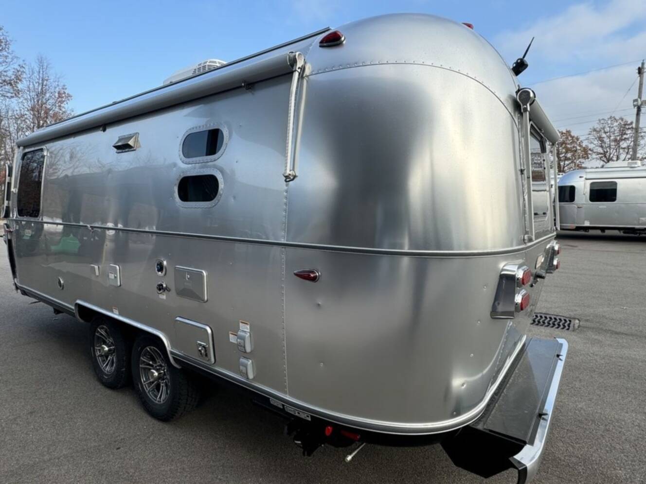 A photo of this 2025 Airstream Trade Wind 23FB