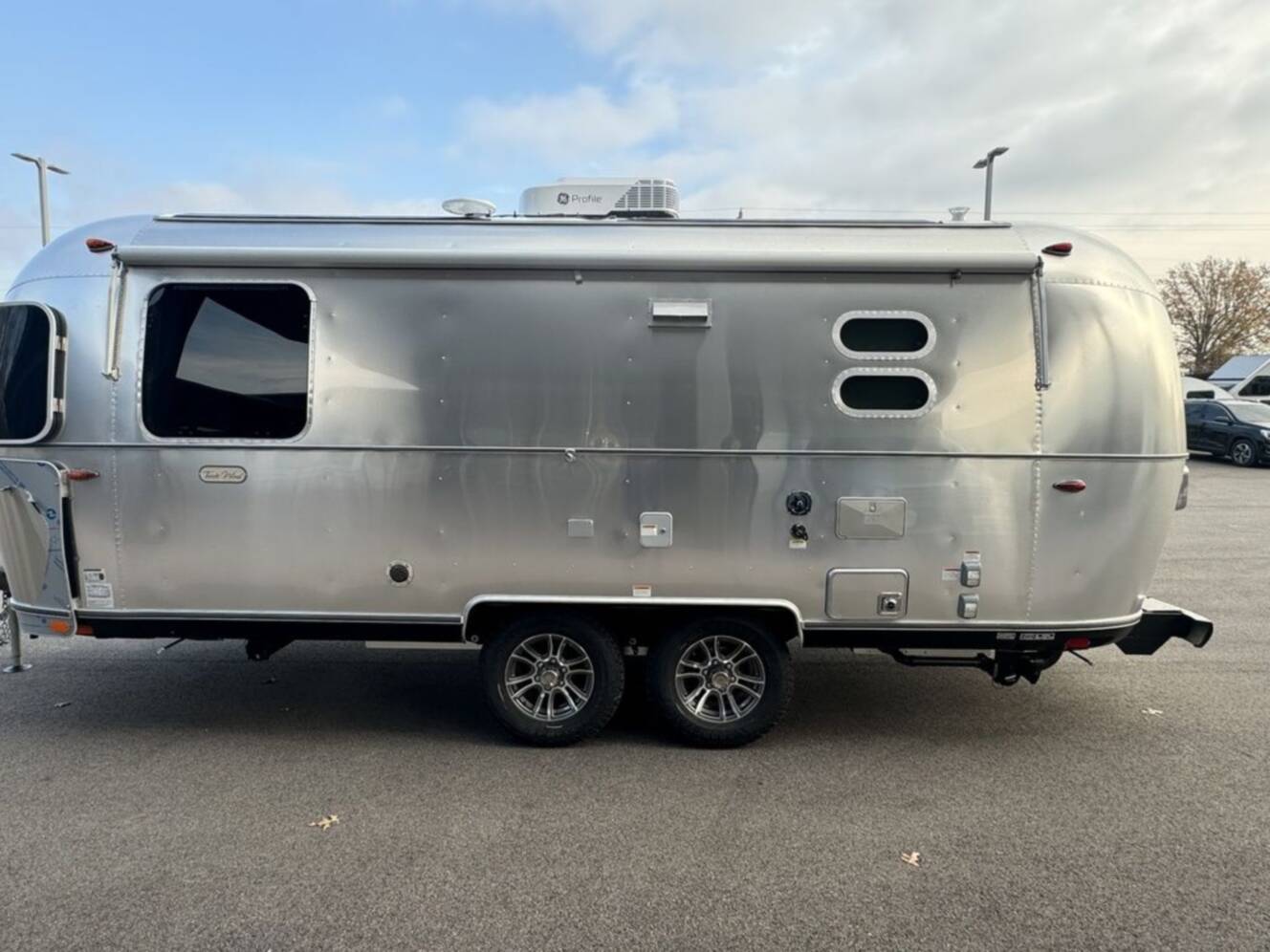 A photo of this 2025 Airstream Trade Wind 23FB