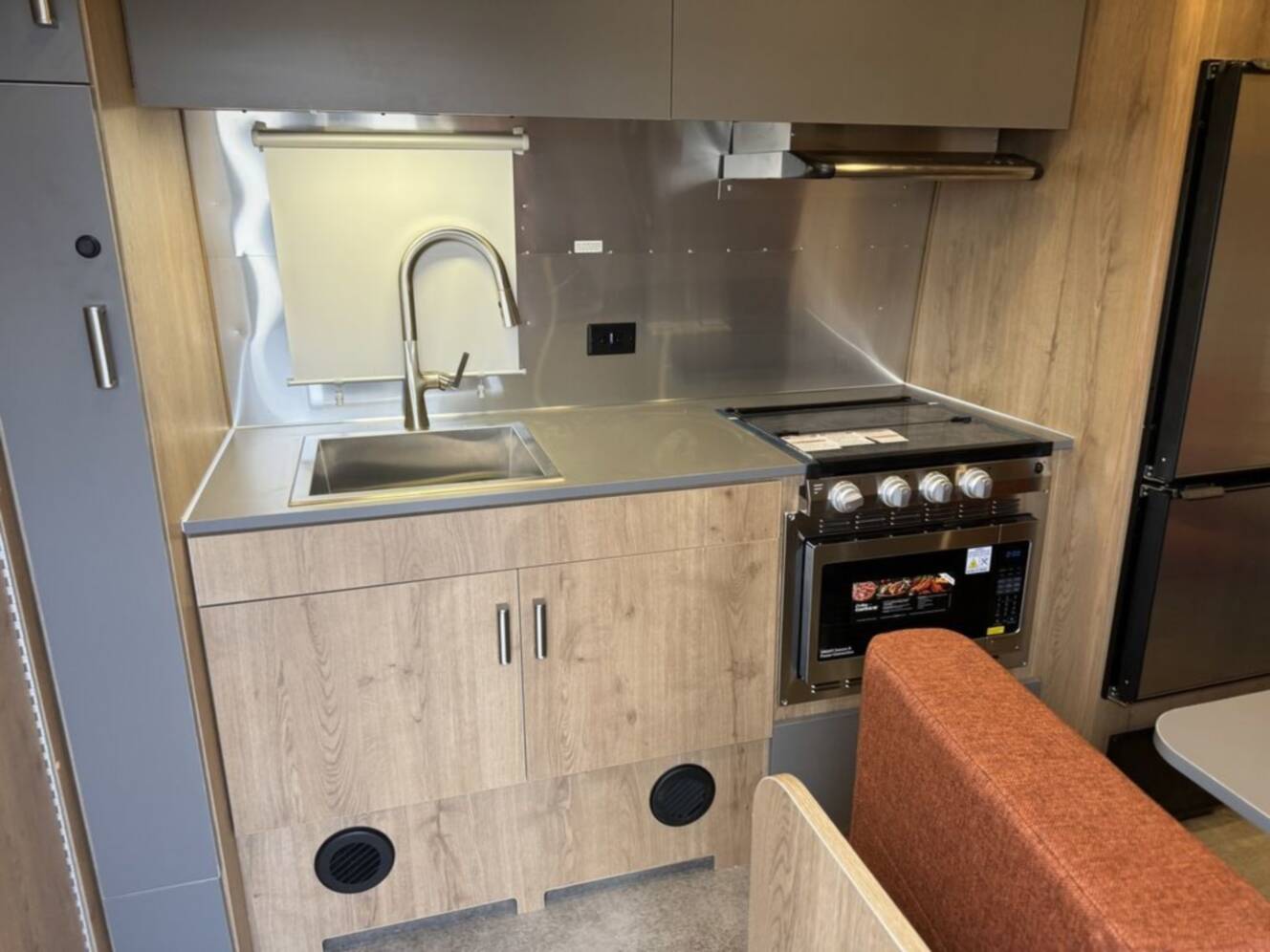 A photo of this 2025 Airstream Trade Wind 23FB