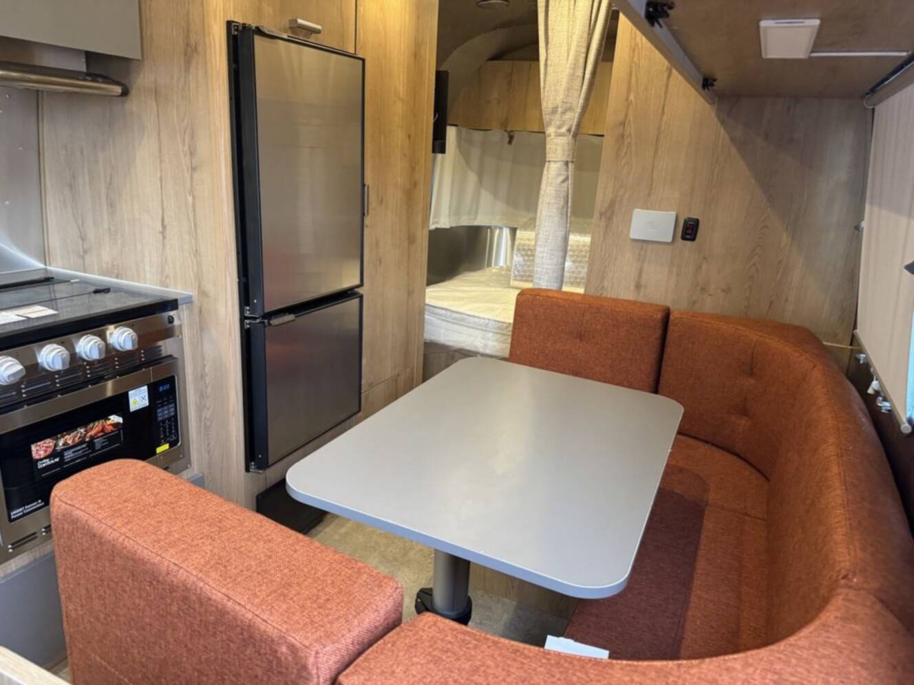 A photo of this 2025 Airstream Trade Wind 23FB