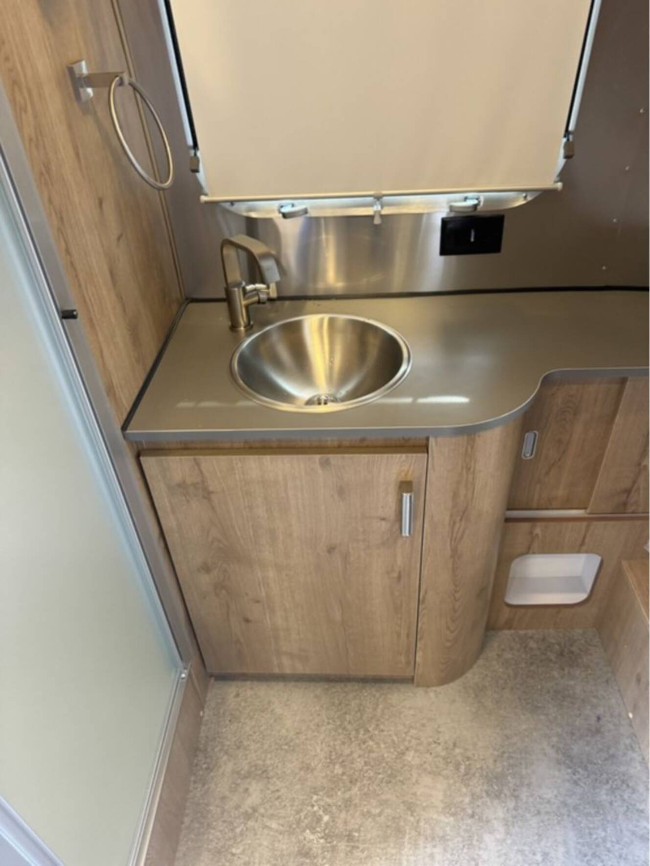 A photo of this 2025 Airstream Trade Wind 23FB