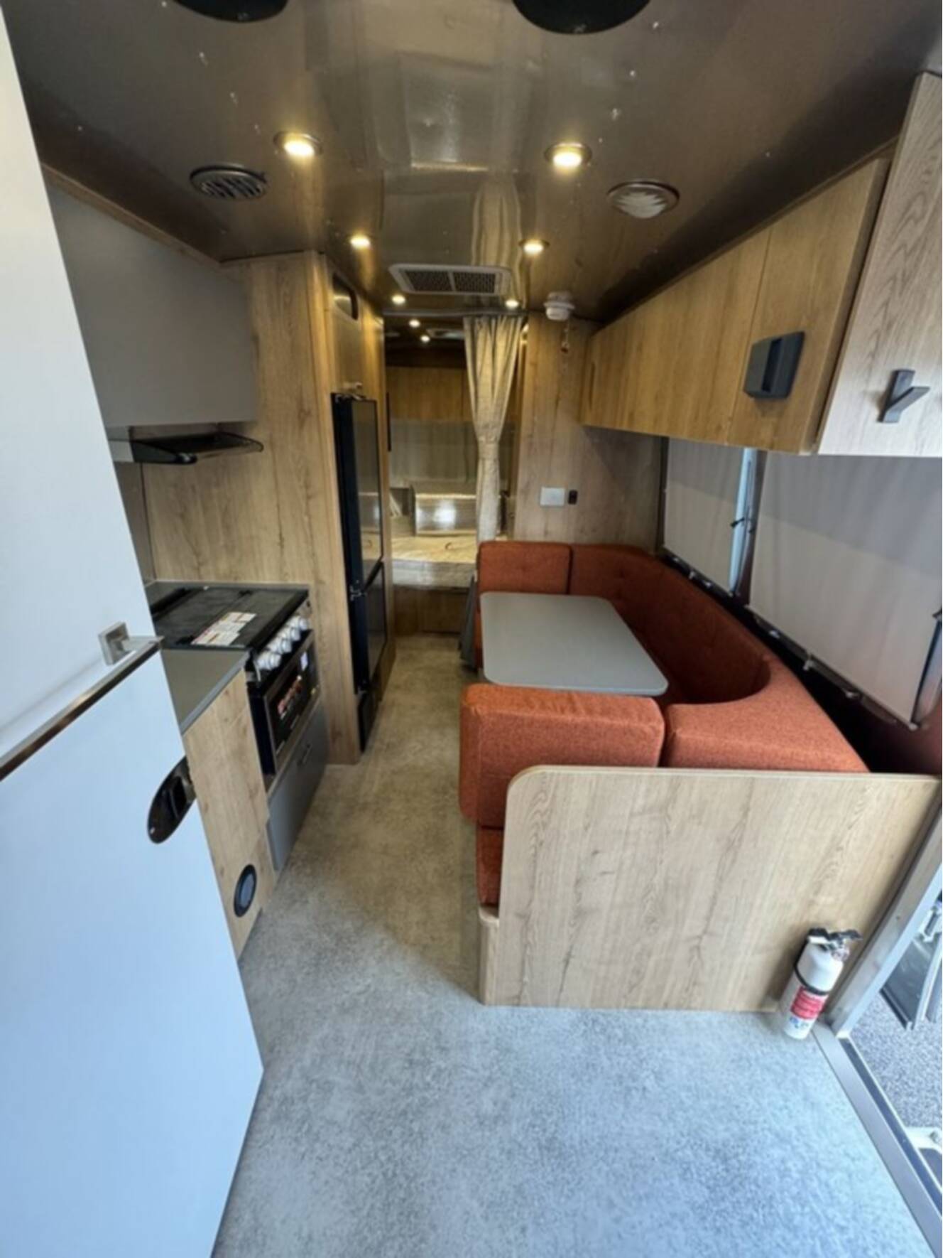 A photo of this 2025 Airstream Trade Wind 23FB