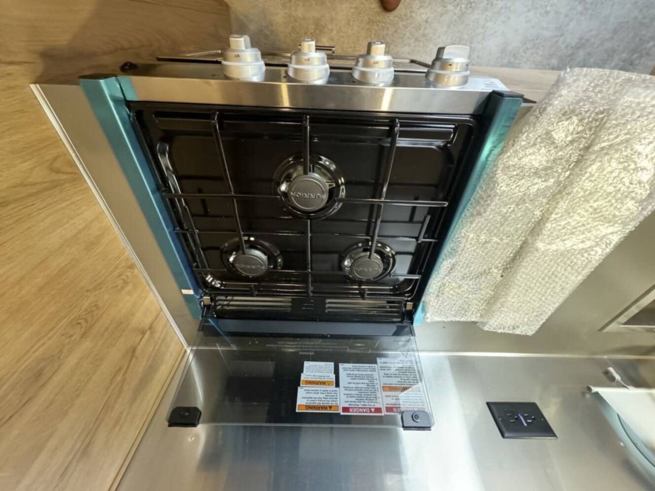 A photo of this 2025 Airstream Trade Wind 23FB