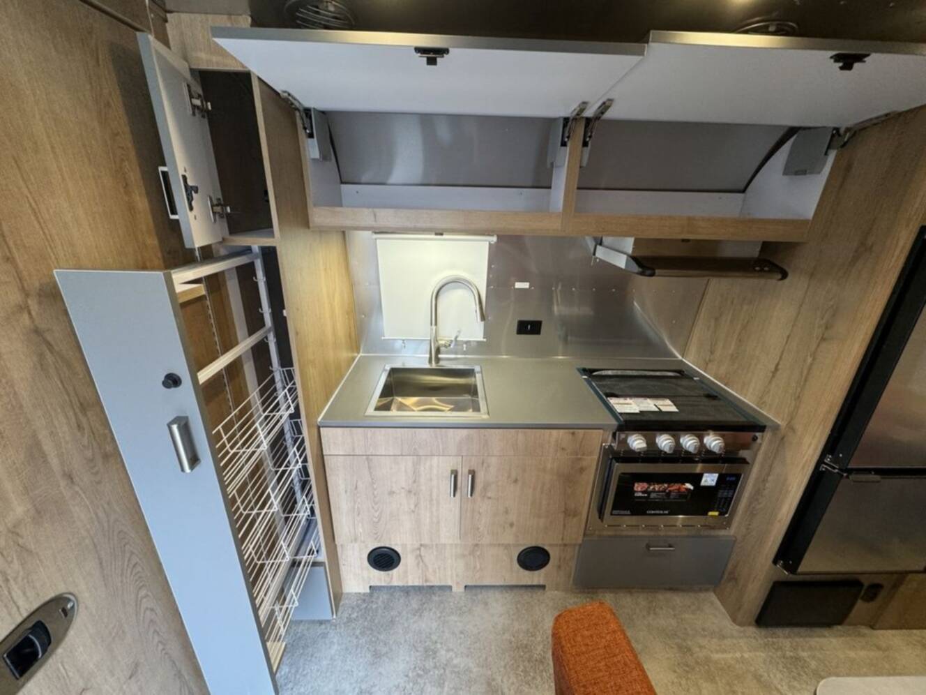 A photo of this 2025 Airstream Trade Wind 23FB