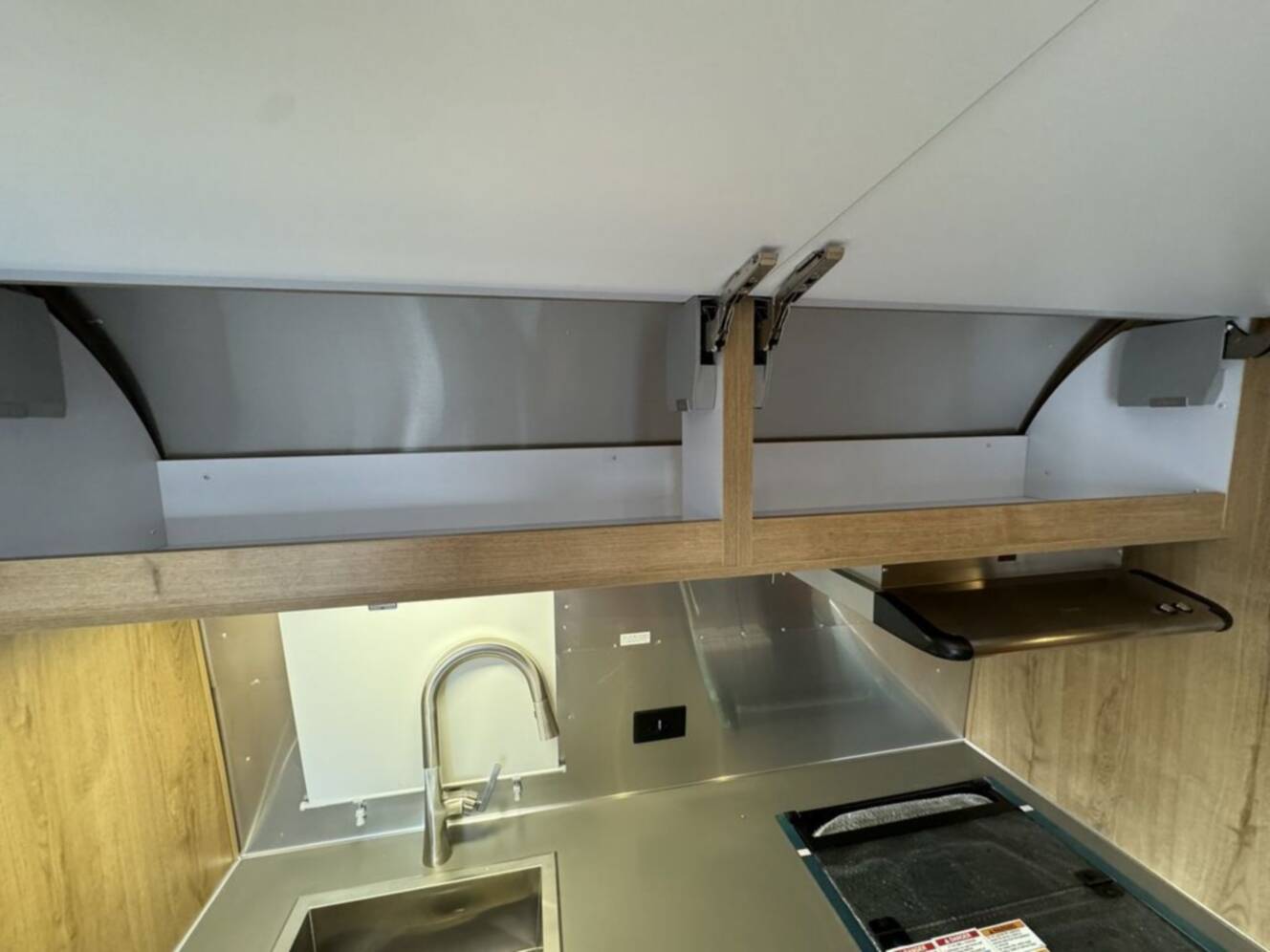 A photo of this 2025 Airstream Trade Wind 23FB
