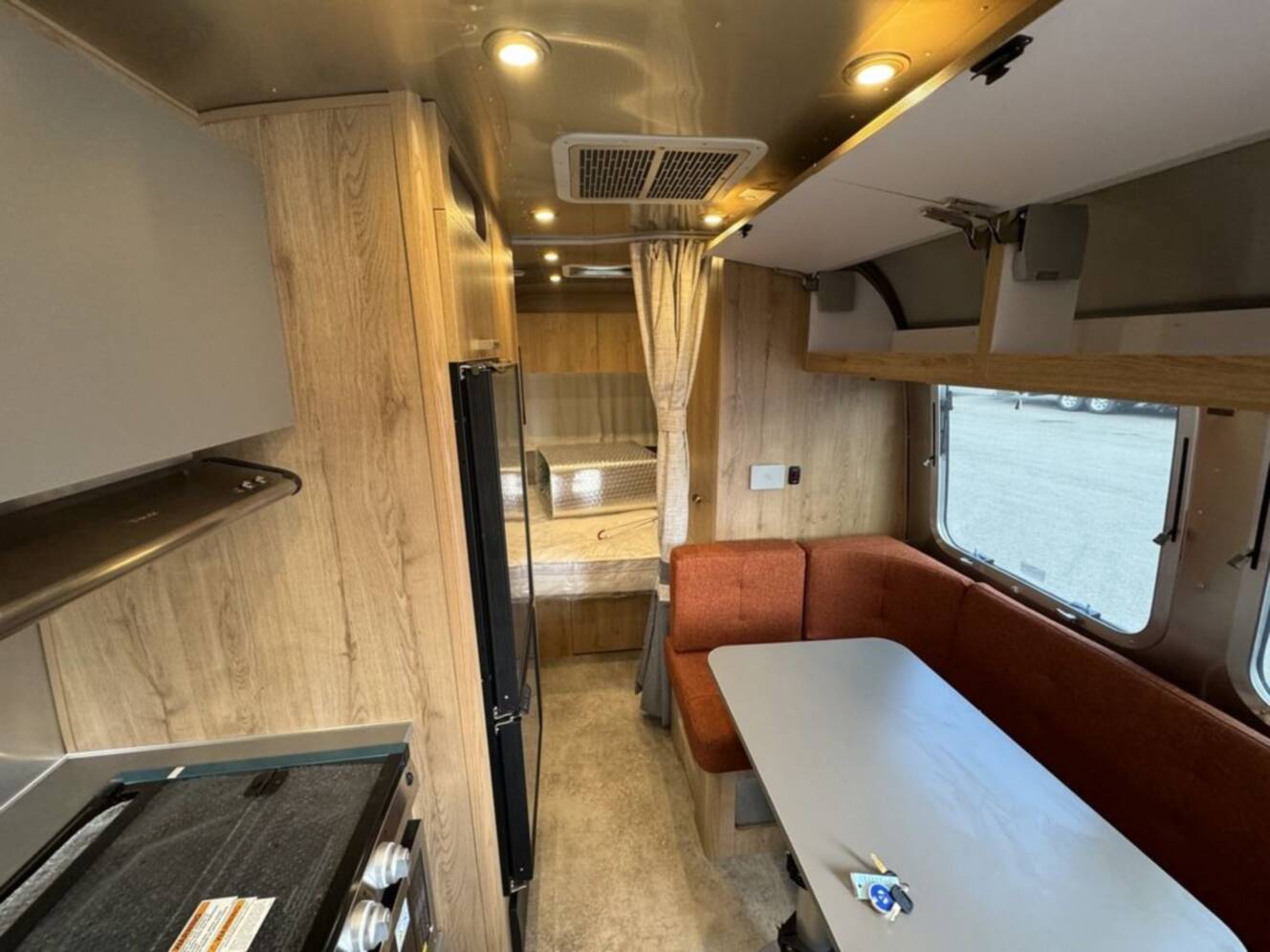 A photo of this 2025 Airstream Trade Wind 23FB